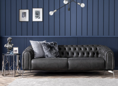 Black Chesterfield style four-seater straight sofa for the living room
